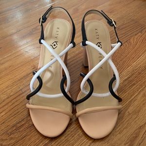 Nude heels with black and white straps